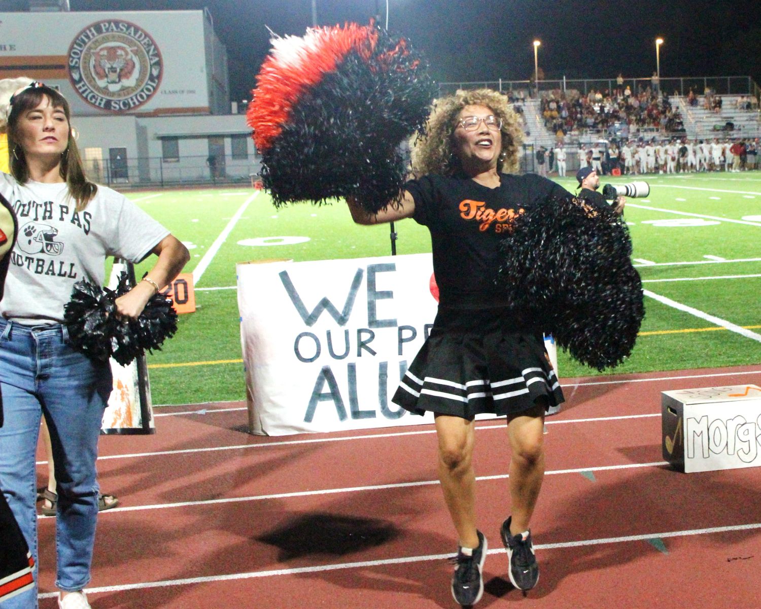 PHOTO: Henk Friezer | The South Pasadenan | Alumni join current SPHS cheerleaders on the field for Homecoming 2023.