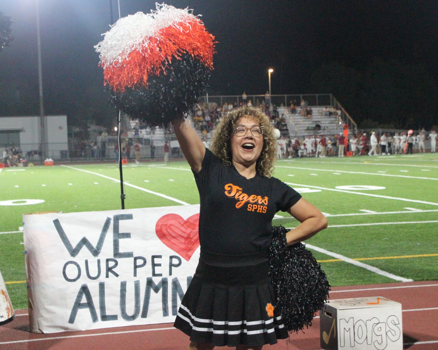 PHOTO: Henk Friezer | The South Pasadenan | Alumni join current SPHS cheerleaders on the field for Homecoming 2023.