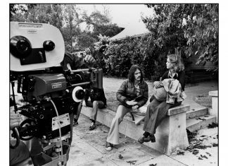 John Carpenter’s Iconic “Halloween” Film Legacy Started and Continues to Grow in South Pasadena PHOTO: Kim Gottlieb-Walker | SouthPasadenan.com | John Carpenter and the soon-to-be-famous Jamie Lee Curtis on the steps of the “Strode House” across from the Library in March 1978—photo courtesy of Kim Gottlieb Walker from her book ‘On Set with John Carpenter: The Photographs of Kim Gottlieb-Walker’ available for checkout from the Library. Malek Akkad, owner of the Halloween Franchise has said, "Kim’s work possesses the rare quality that far exceeds the expectations of a typical film unit still photographer. She captures a moment in time that lets the viewer become a part of the collaboration, camaraderie, and fun that is inherent on the film sets on which she has worked. Her pictures are a fascinating glimpse at the other side of the action, and tell a deeper story for fans of these great films to appreciate