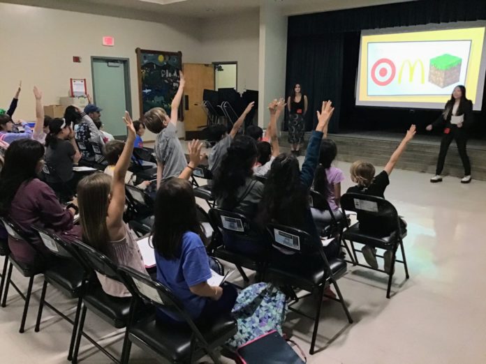 PHOTO: provided by SPUSD | The South Pasadenan | SPHS Virtual Enterprise students teach Arroyo Vista students marketing tips in preparation for the AV Marketplace.