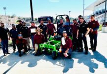 PHOTO: Bill Glazier | The South Pasadenan | Mt. SAC grounds crew gather around electric mower.