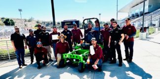 PHOTO: Bill Glazier | The South Pasadenan | Mt. SAC grounds crew gather around electric mower.