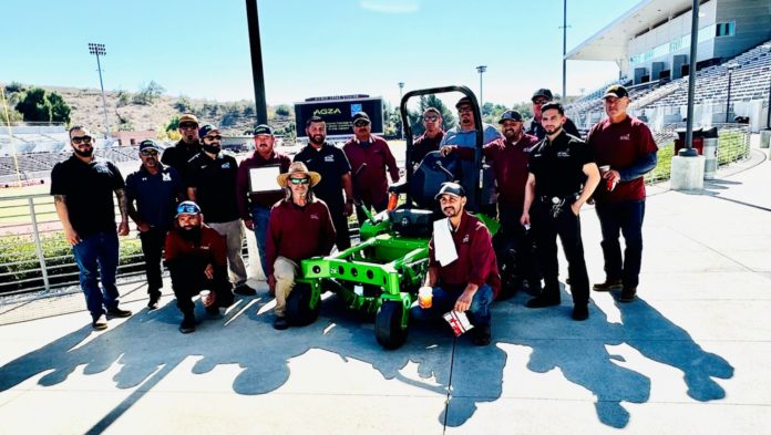 PHOTO: Bill Glazier | The South Pasadenan | Mt. SAC grounds crew gather around electric mower.