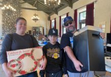 SPTOR November Yard Sale Raises Most Ever to Fund South Pas Float PHOTO: provided by SPTOR | South Pasadenan News | The Moreno Family finds dinnerware for the holidays and a shredder at the SPTOR sale.