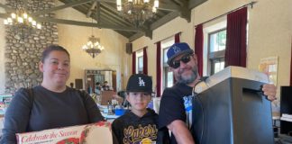 PHOTO: provided by SPTOR | South Pasadenan News | The Moreno Family finds dinnerware for the holidays and a shredder at the SPTOR sale.