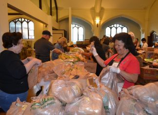 Holy Family and Community Give Out Over 500 Turkeys for Thanksgiving