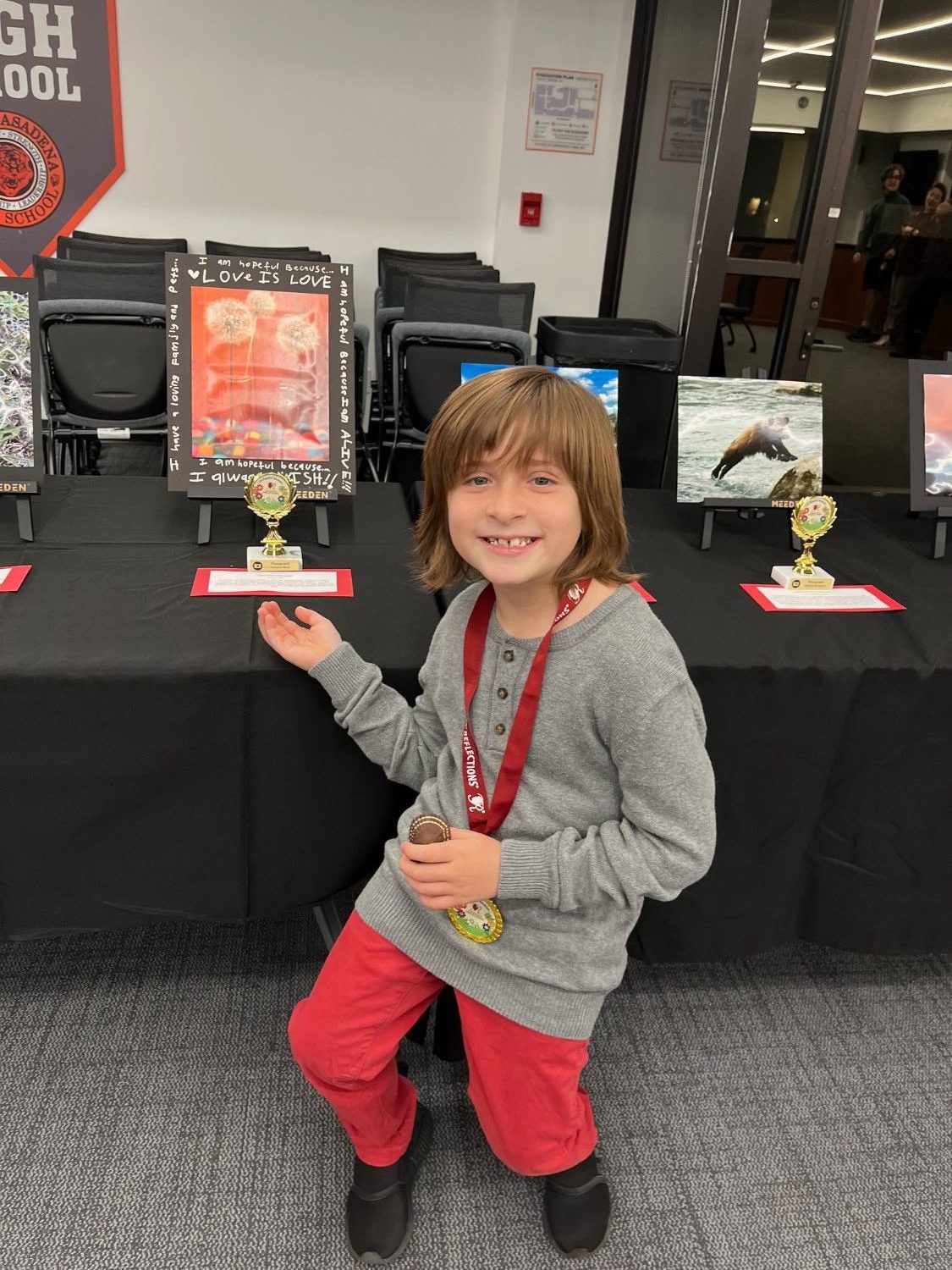 south-pasadena-news-12-01-2023-ptsa-reflections-dylan-rubin-02 | The South Pasadenan | South Pasadena News PHOTO: Cindy Ann Rubin | The South Pasadenan | Dylan Rubin at the PTSA Reflections Exhibit held at the South Pasadena Unified School District office.