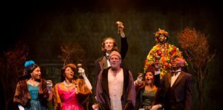 PHOTO: Craig Schwartz | The South Pasadenan | Geoff Elliot as Ebenezer Scrooge and the cast of A Christmas Carol at A Noise Within.
