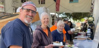 PHOTO: Sally Kilby | The South Pasadenan | Brant Dunlap, Mary Jane Juranek and Anita Scott take a break from working on the float to enjoy a taco salad lunch from Hi-Life.