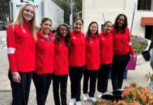 PHOTO: Bill Glazier | The South Pasadenan | The Tournament of Roses Queen and Court gather in front of flowers that arrived this week before being placed on South Pasadena’s float – “Boogie Fever” – in time for Monday’s Rose Parade in Pasadena.