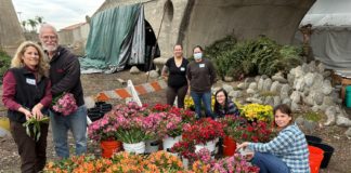 PHOTO: Bill Glazier | The South Pasadenan | A core group of workers put in long hours constructing and decorating South Pasadena’s Rose Parade float throughout the year before hundreds more help down the stretch with the finishing touches ahead of the traditional New Year’s Day event in Pasadena.