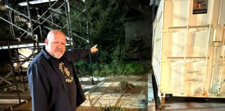 PHOTO: Bill Glazier | The South Pasadenan | Ed  Donnelly, chair of the South Pasadena Tournament of Roses, points to an area behind the War Memorial Building where a permanent building is projected to someday house the city’s float. Over the years, the float has been constructed in a giant circus-like tent at the site.
