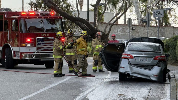 PHOTO: Steven Lawrence | The South Pasadenan News | Morning car fire quickly handled by South Pasadena Fire Department & Police. Driver with burn injuries to hands
