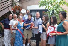 Bungalow 1026 Holds Festive Ribbon Cutting in Tranquil Courtyard